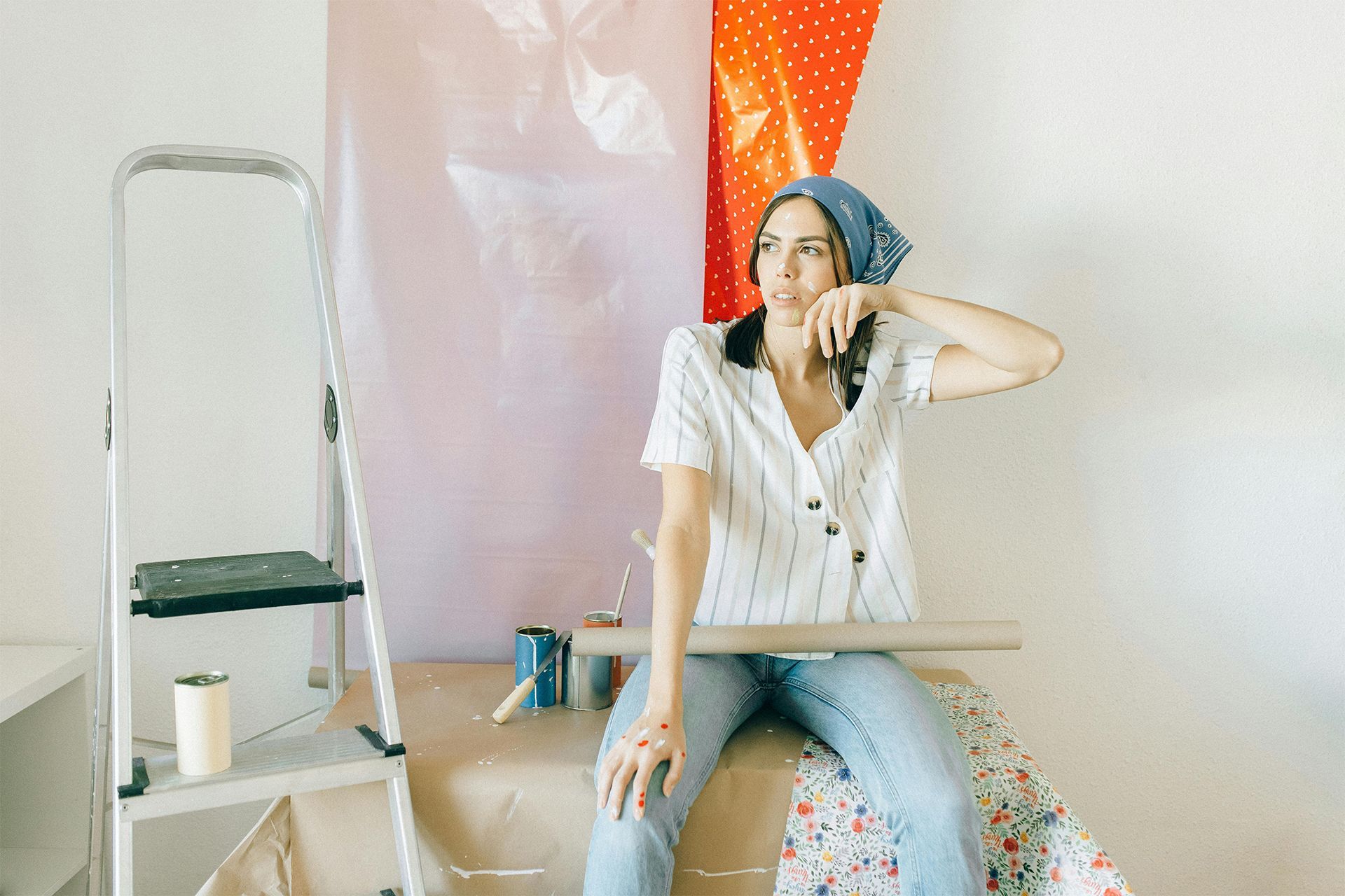 A woman renovating a room.