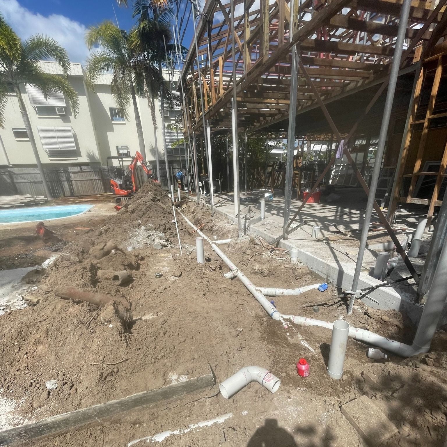 A construction site with a lot of pipes