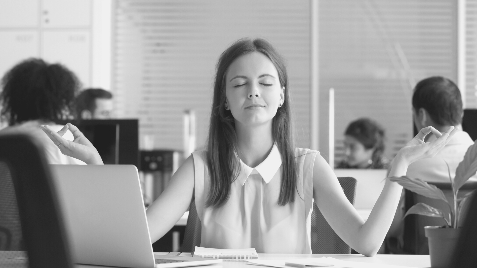 Woman trying to release stress in the workplace