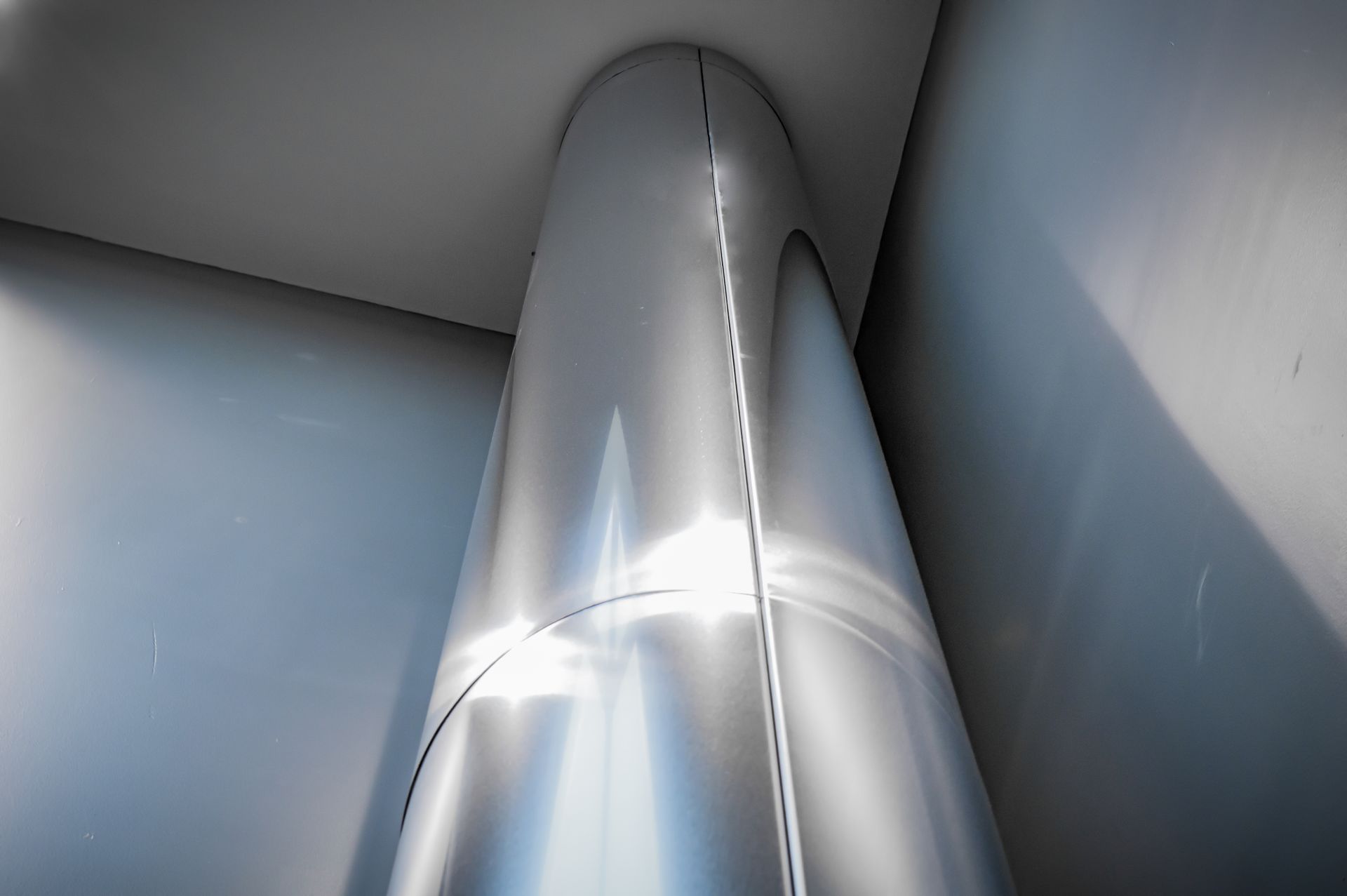 custom polished stainless steel column cover