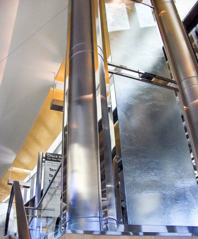 custom polished stainless steel column cover