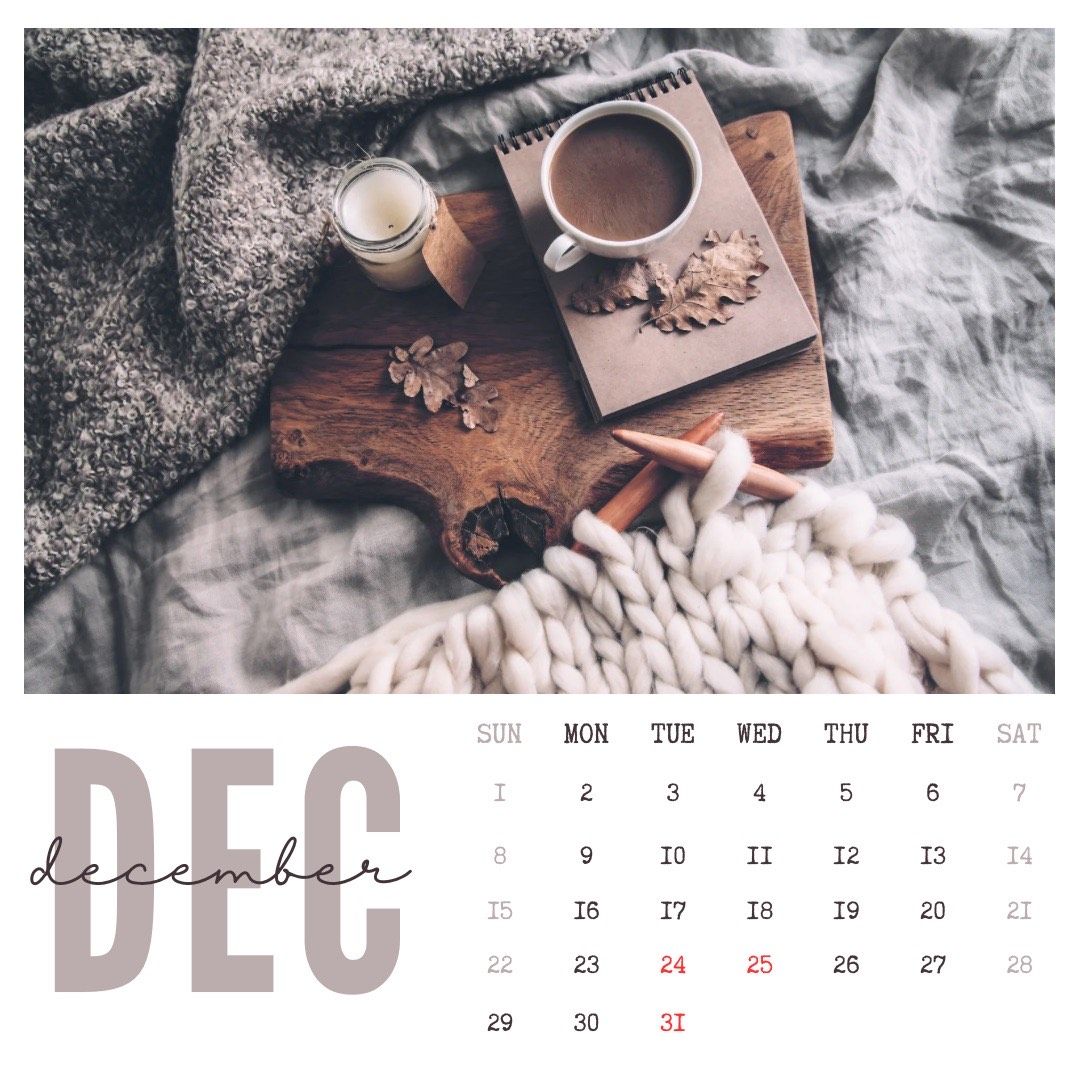 A calendar for december with a cup of coffee on a cutting board