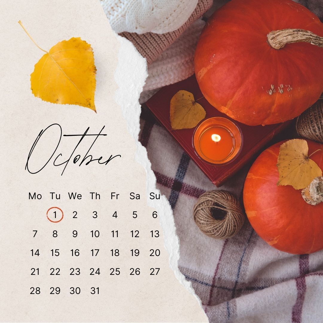 A calendar for october with pumpkins and a candle