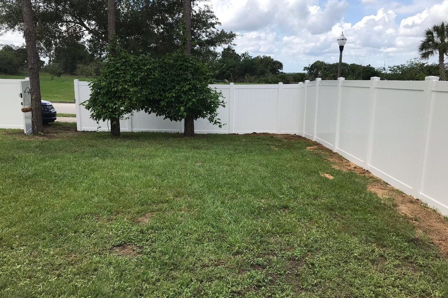 Newly Built White Vinyl Fence — Tavares, FL — Allstar Fence Florida
