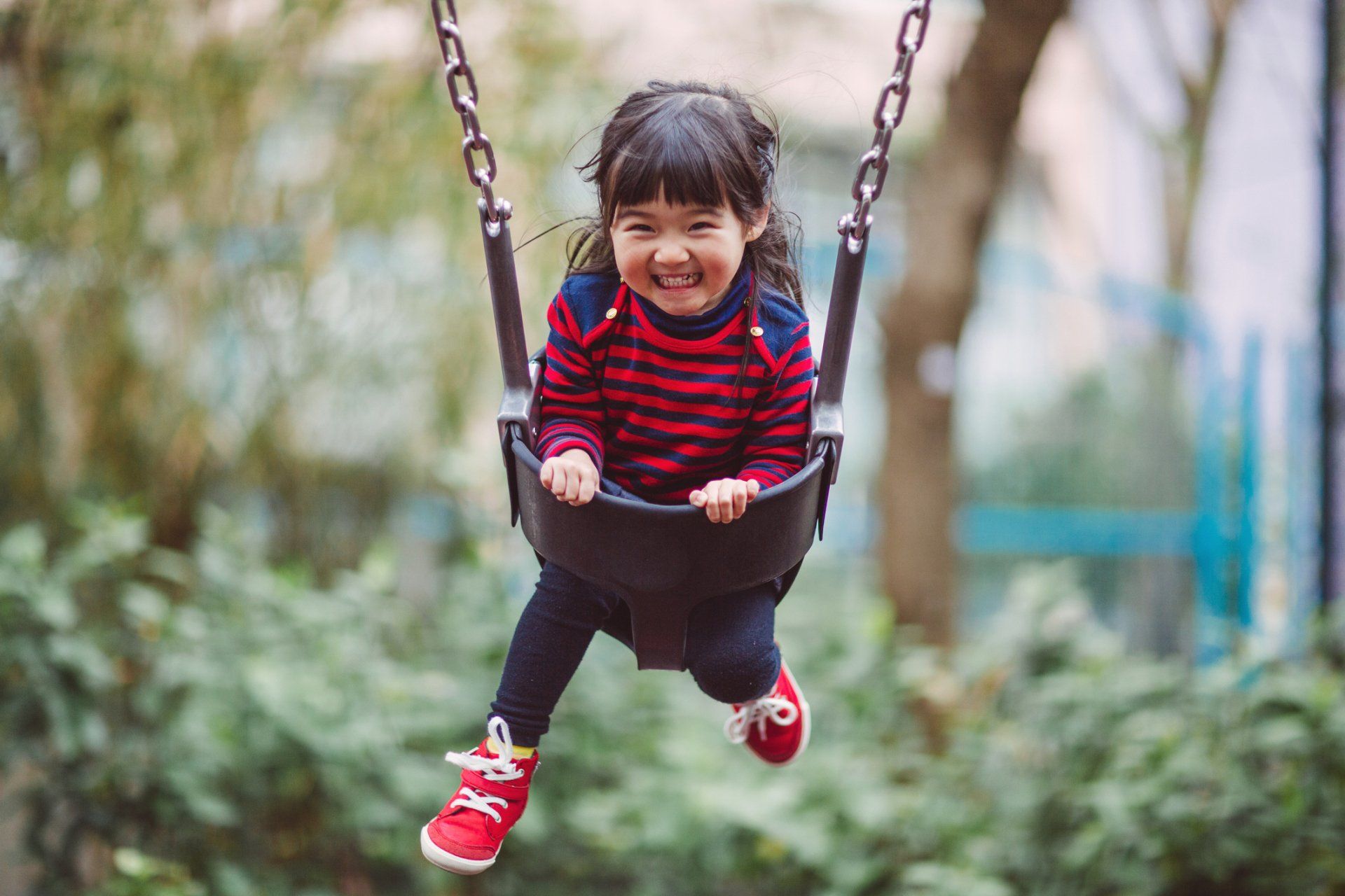 Little Girl Swinging On The Swing — Surprise, AZ — Arizona Kids Pediatrics