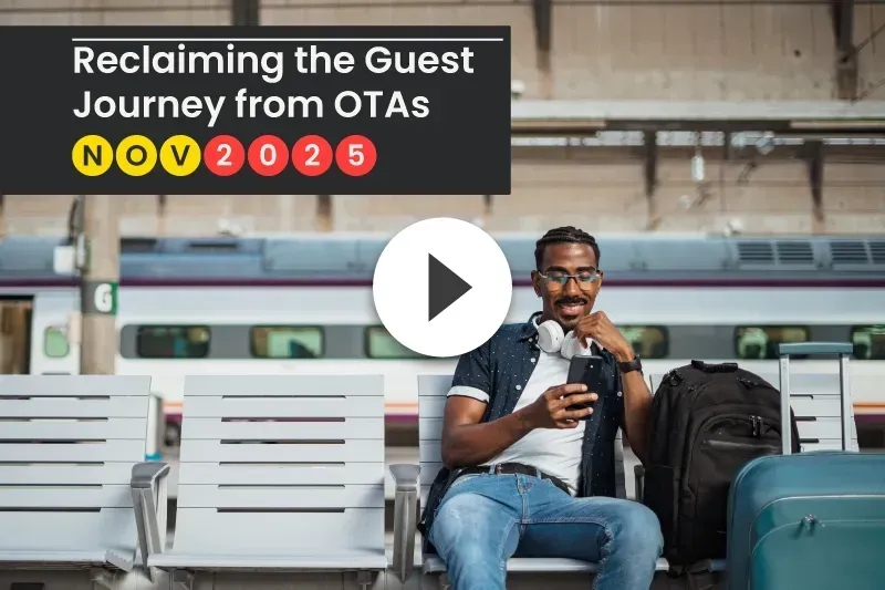 Person waiting with travel bags and using smartphone