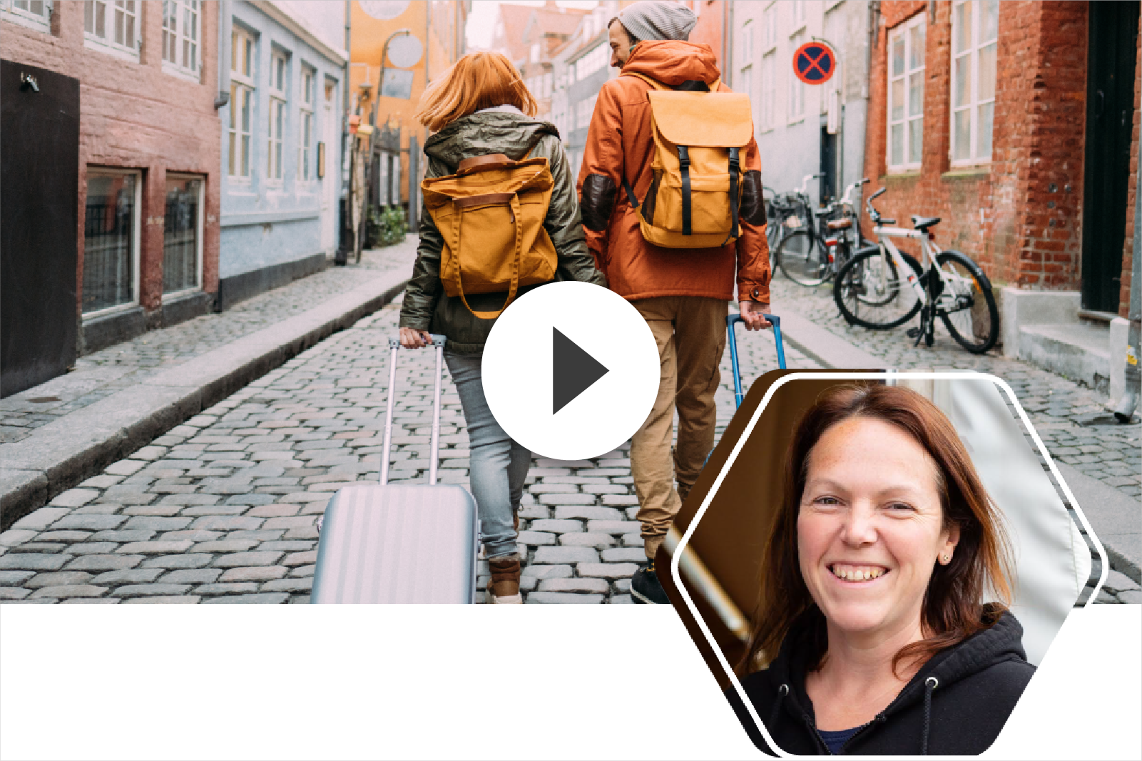 Couple walking cobblestone street with luggage and backpacks, woman in inset smiling.