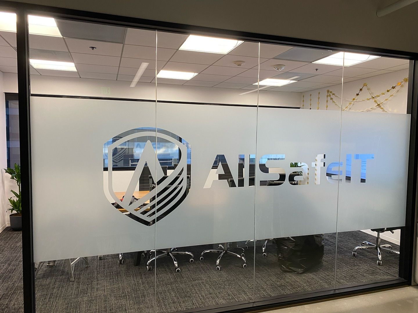 A glass door with a city of riverside logo on it