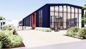 An artist 's impression of a large building with a lot of windows.