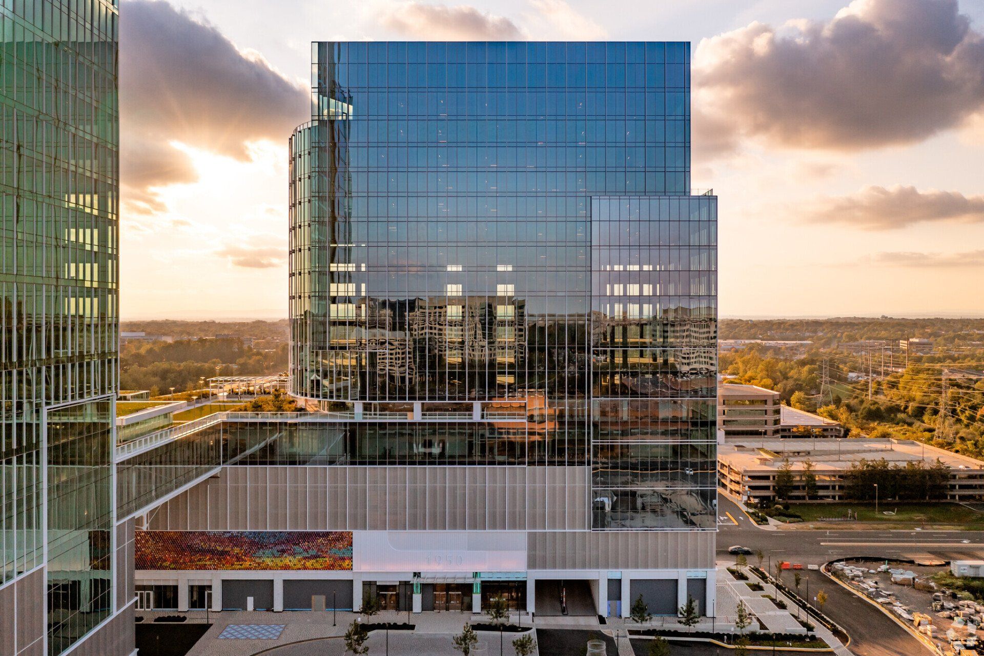 An aerial view of a large building with a lot of windows.