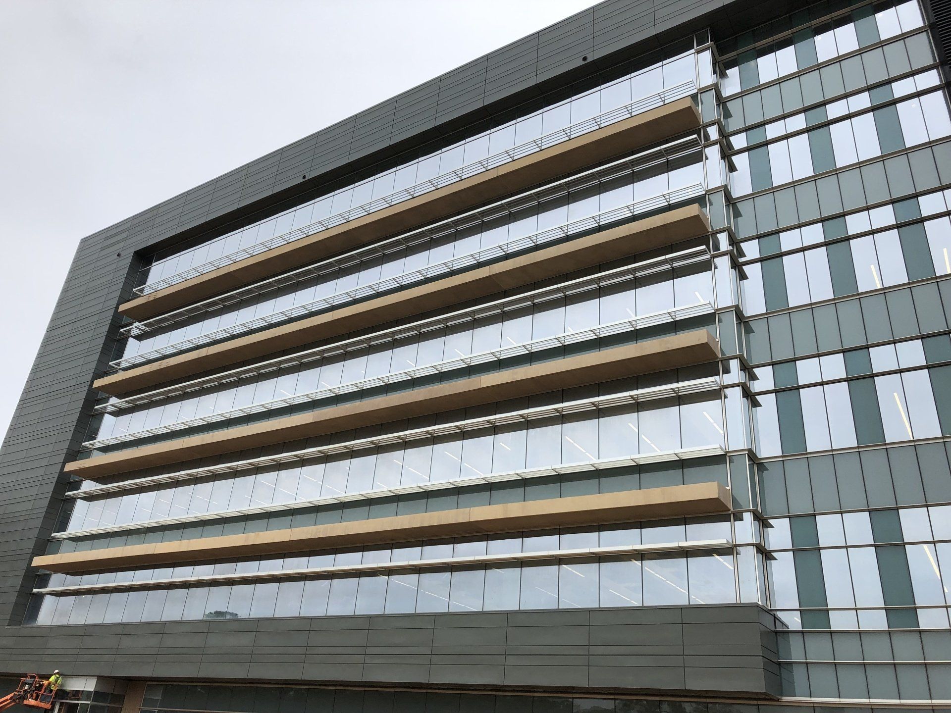 A large building with a lot of windows and balconies