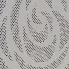 A close up of a white wall with a spiral pattern on it.
