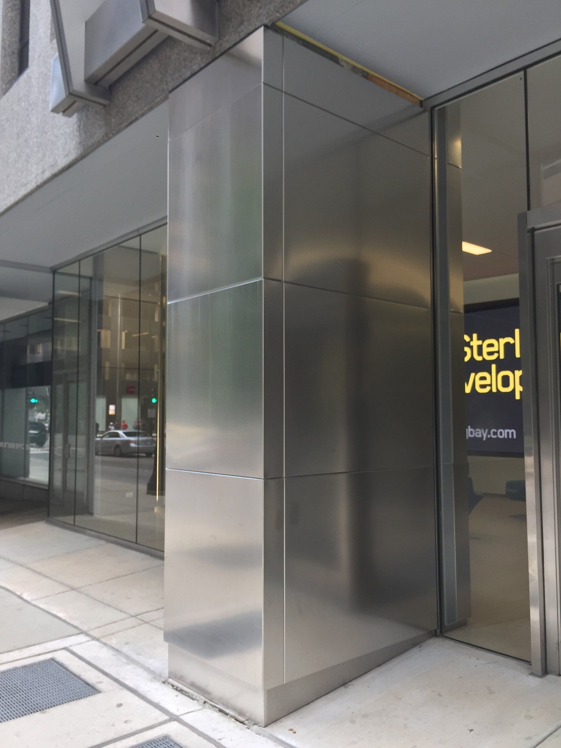 A stainless steel building with a sign that says sterl velox