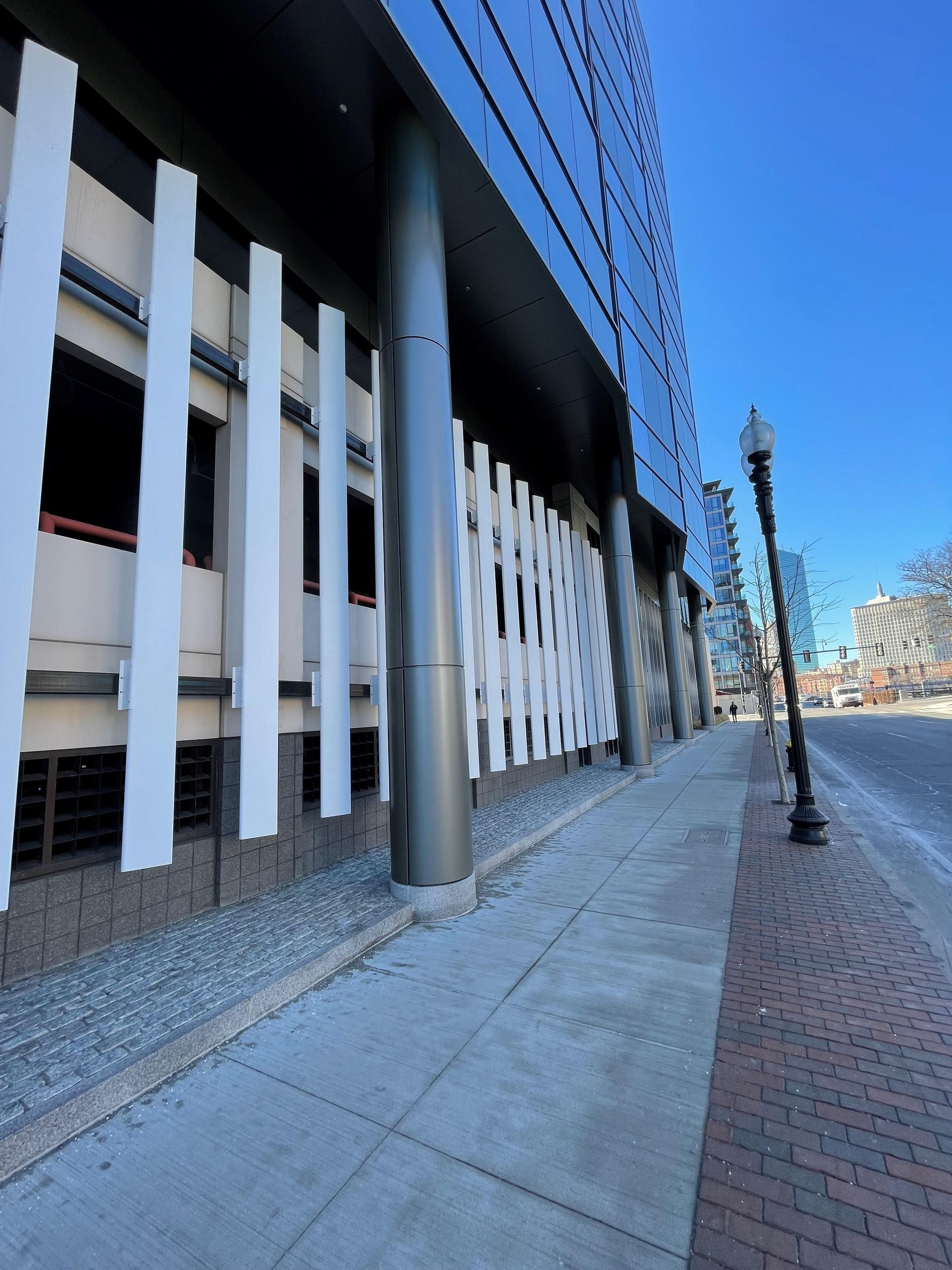 A building with a fence on the side of it