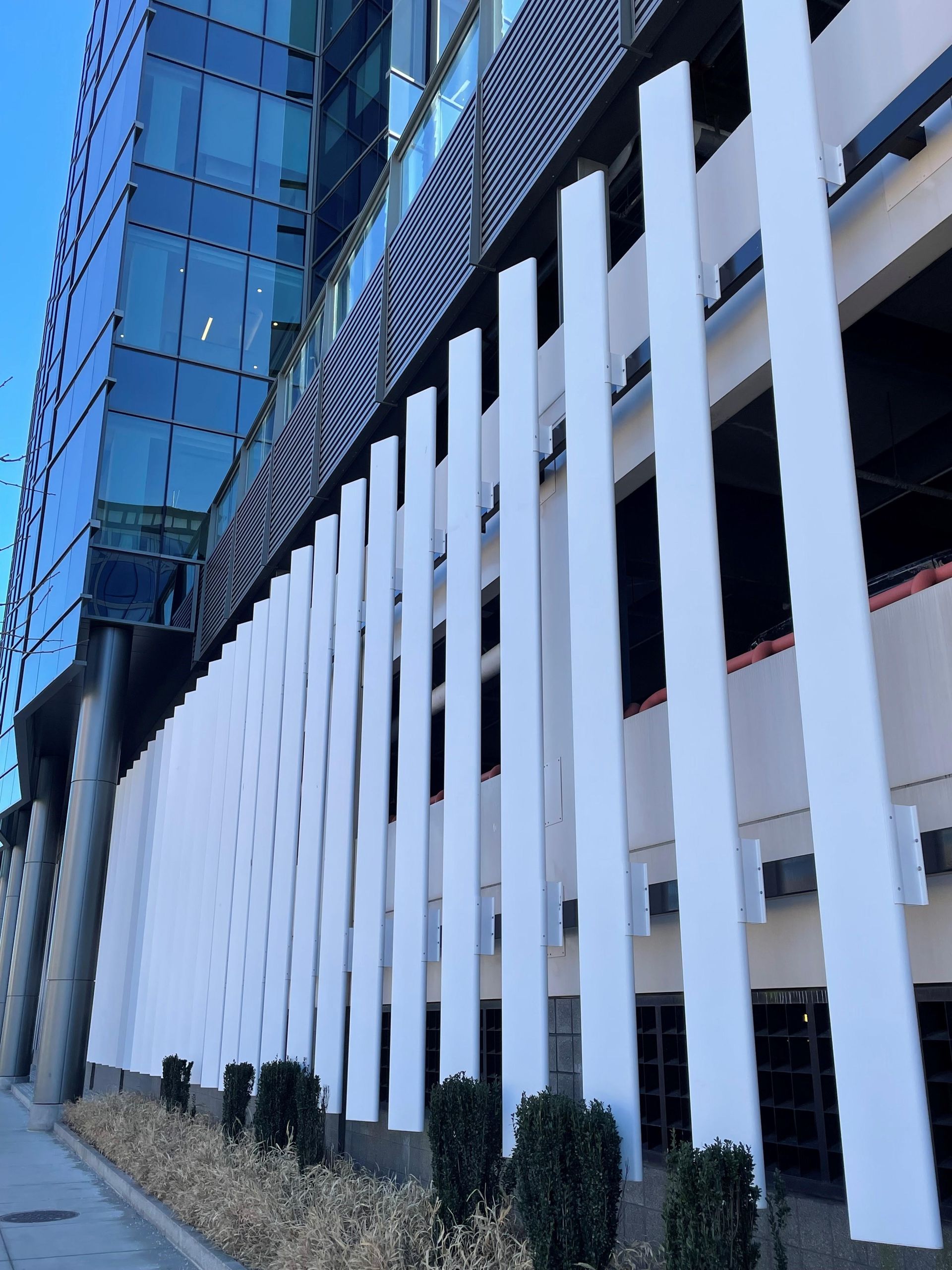 A building with a white fence in front of it