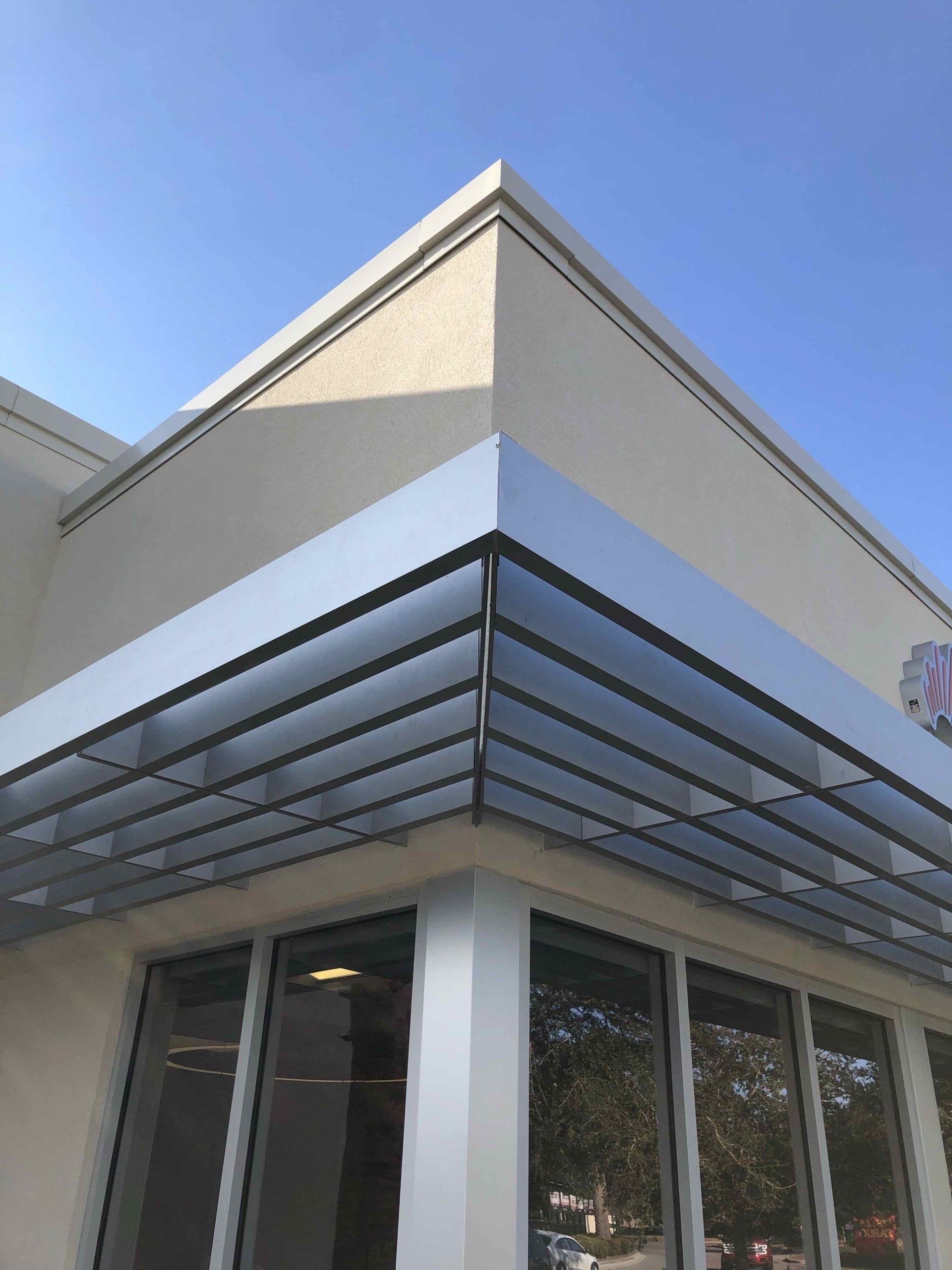 A building with a canopy on the side of it