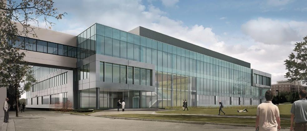 An artist 's impression of a large building with lots of windows