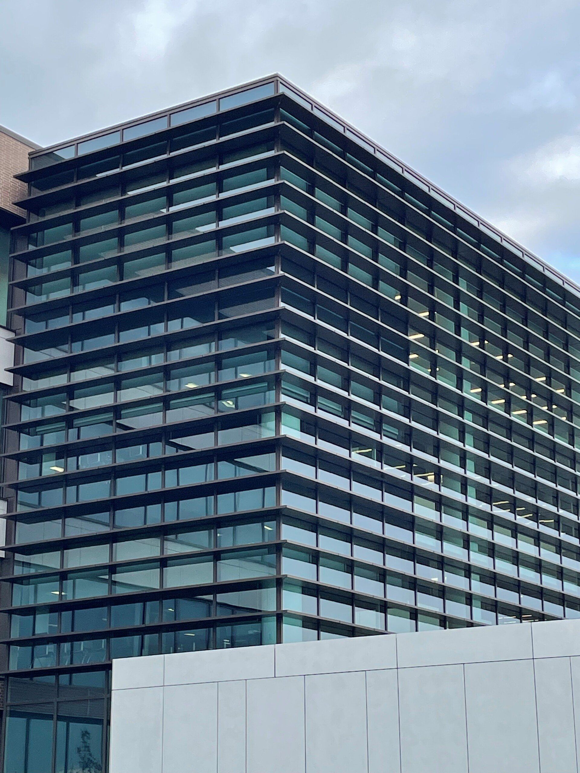 A large building with a lot of windows on it