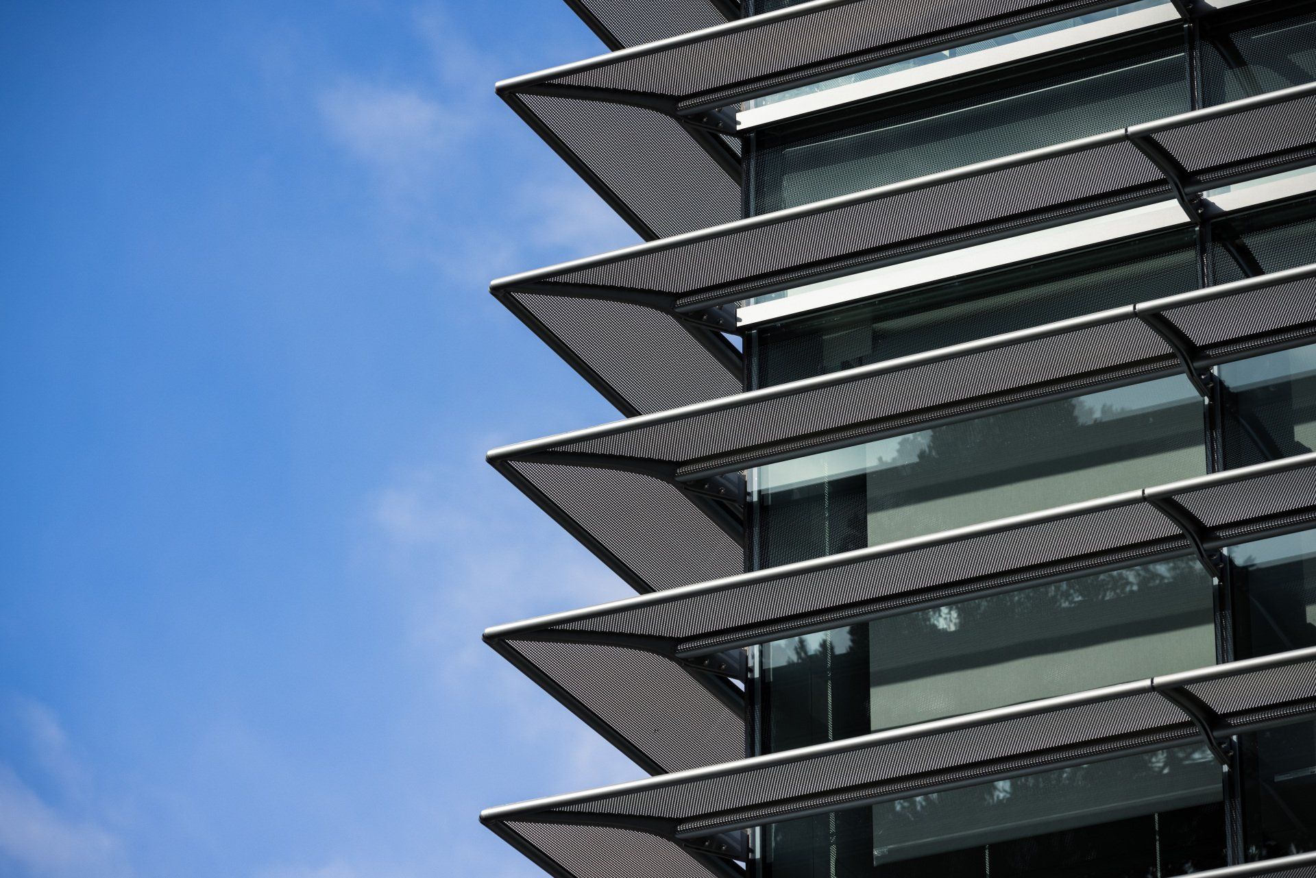 A close up of a building with a blue sky in the background