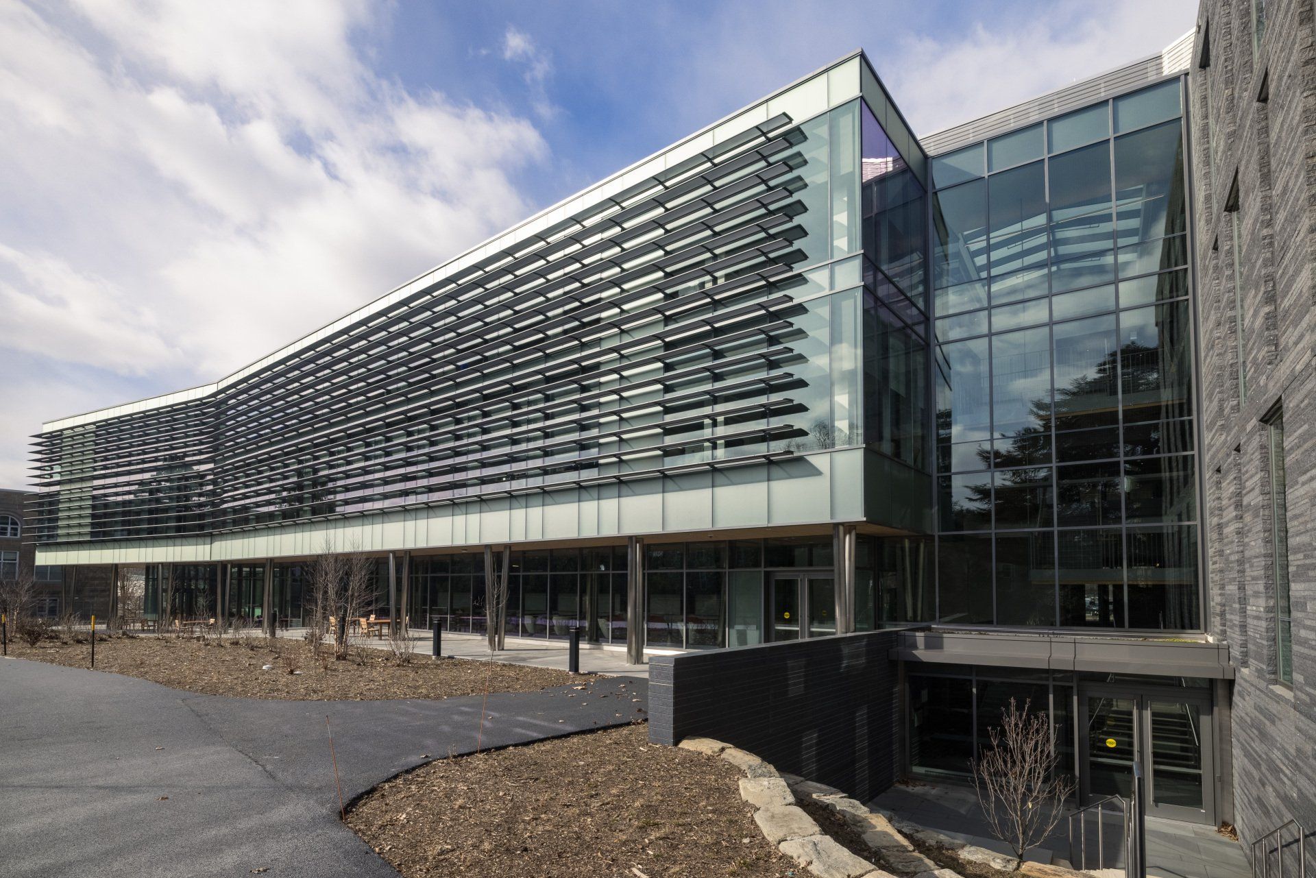 A large glass building with a lot of windows