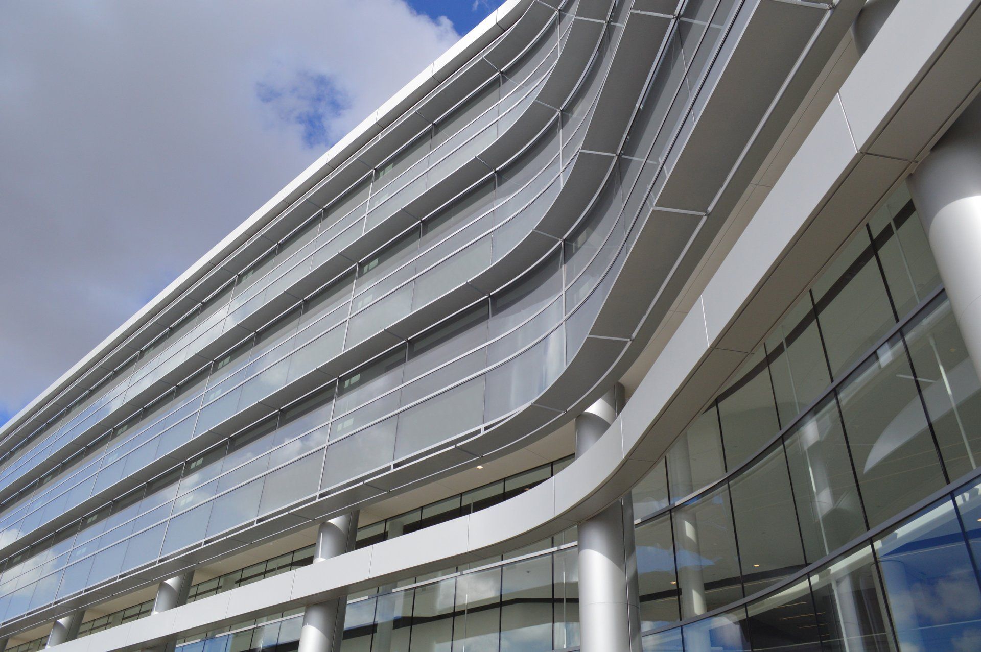 A large building with a lot of windows and columns
