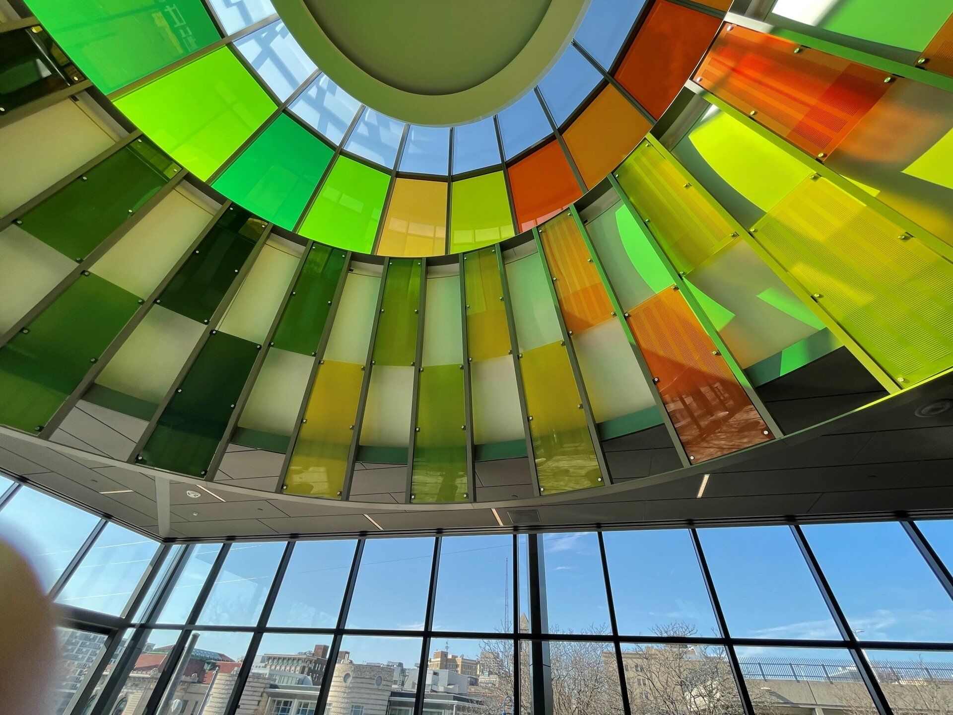 a building with a dome shaped ceiling and a lot of windows