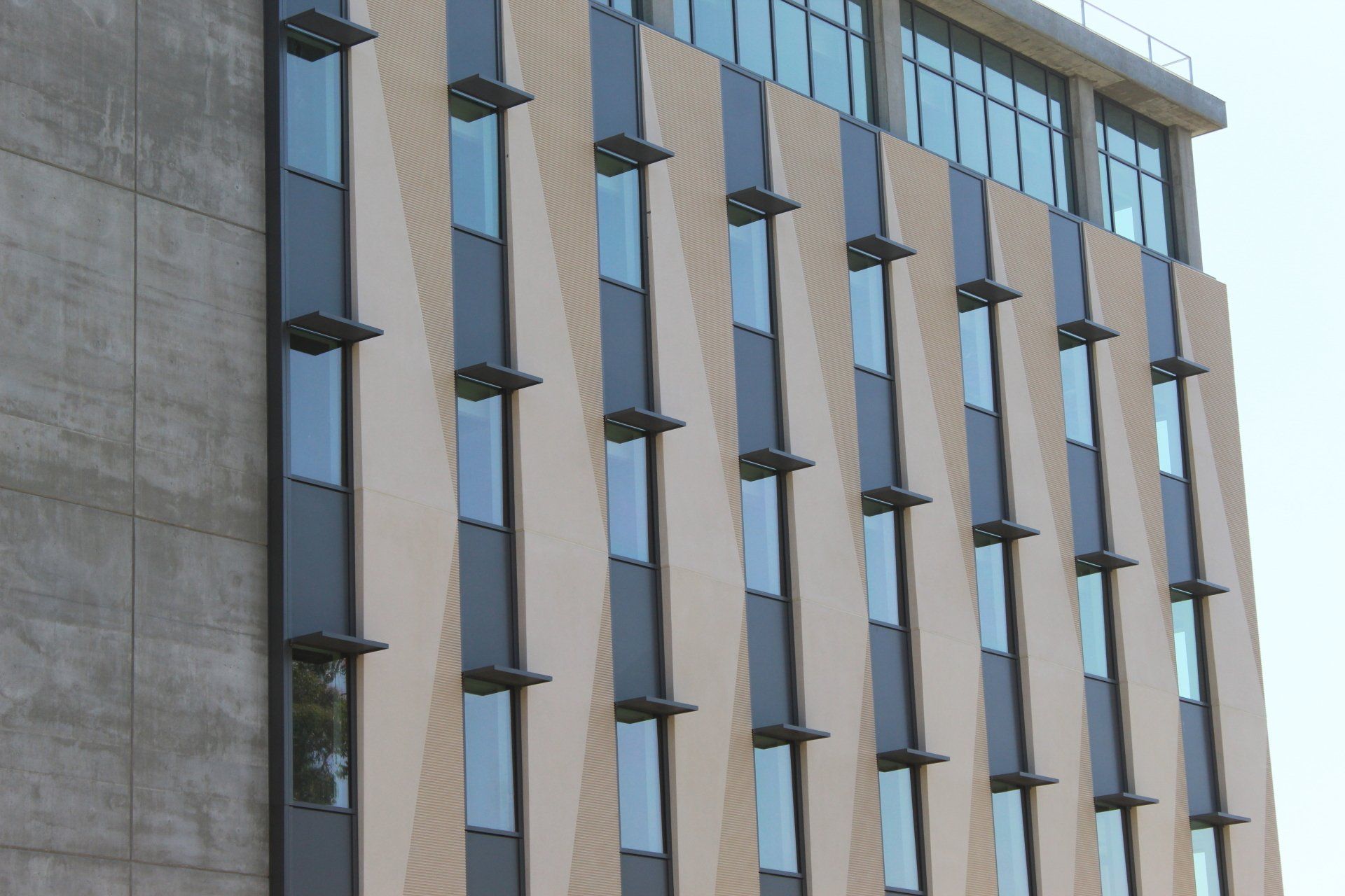 A large building with a lot of windows on it