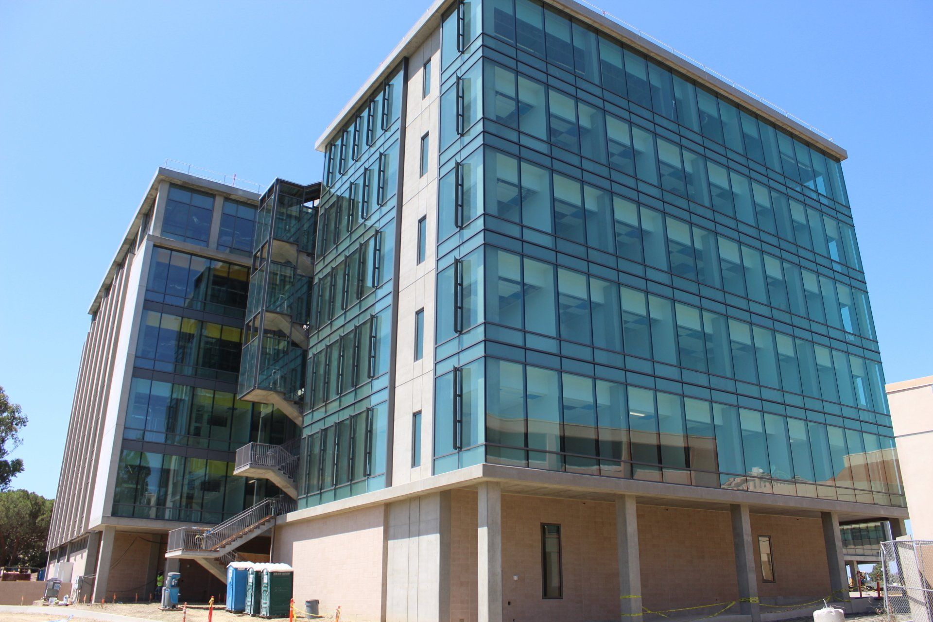 A large building with a lot of windows and stairs