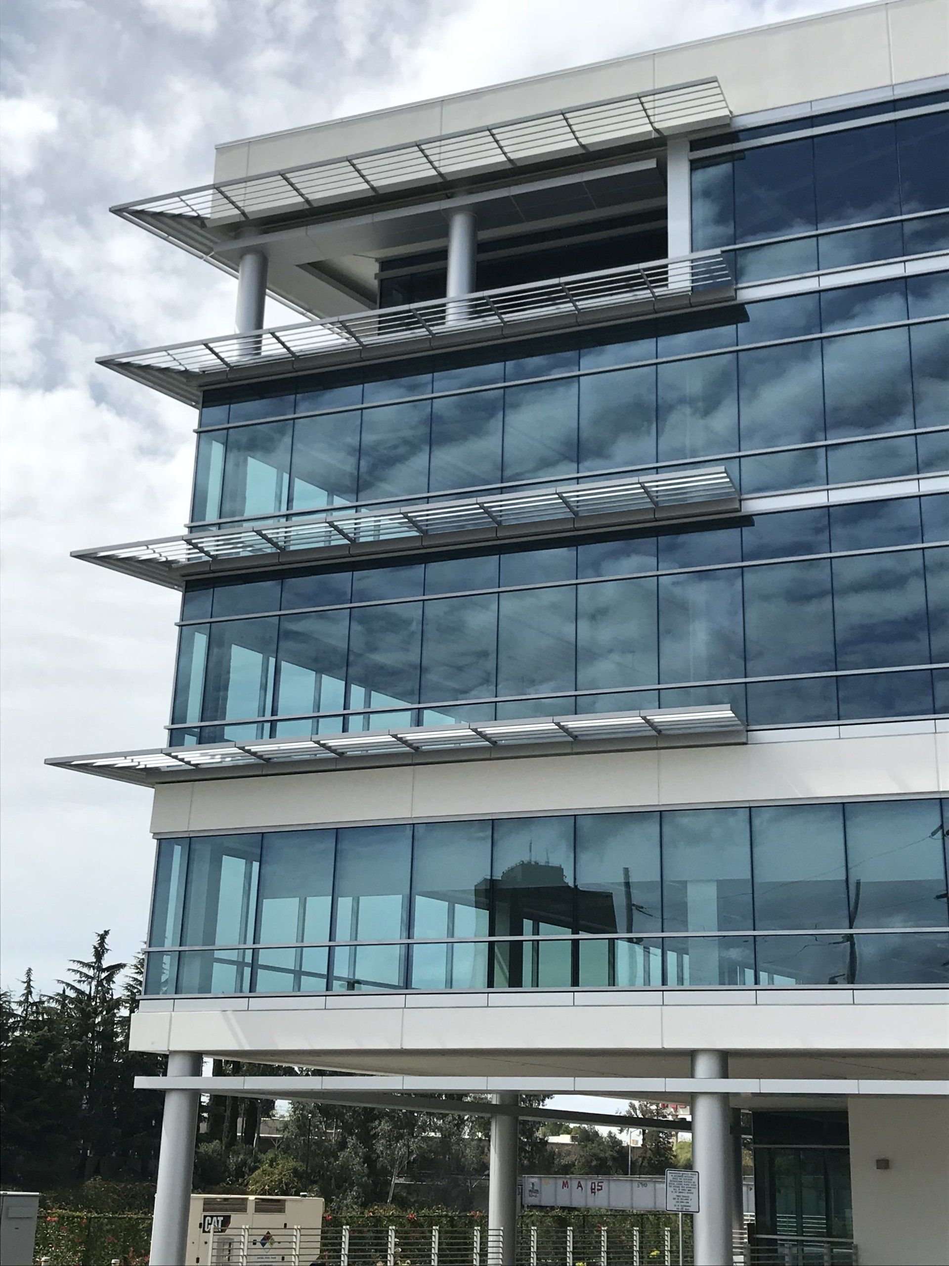 A large building with a lot of windows and balconies