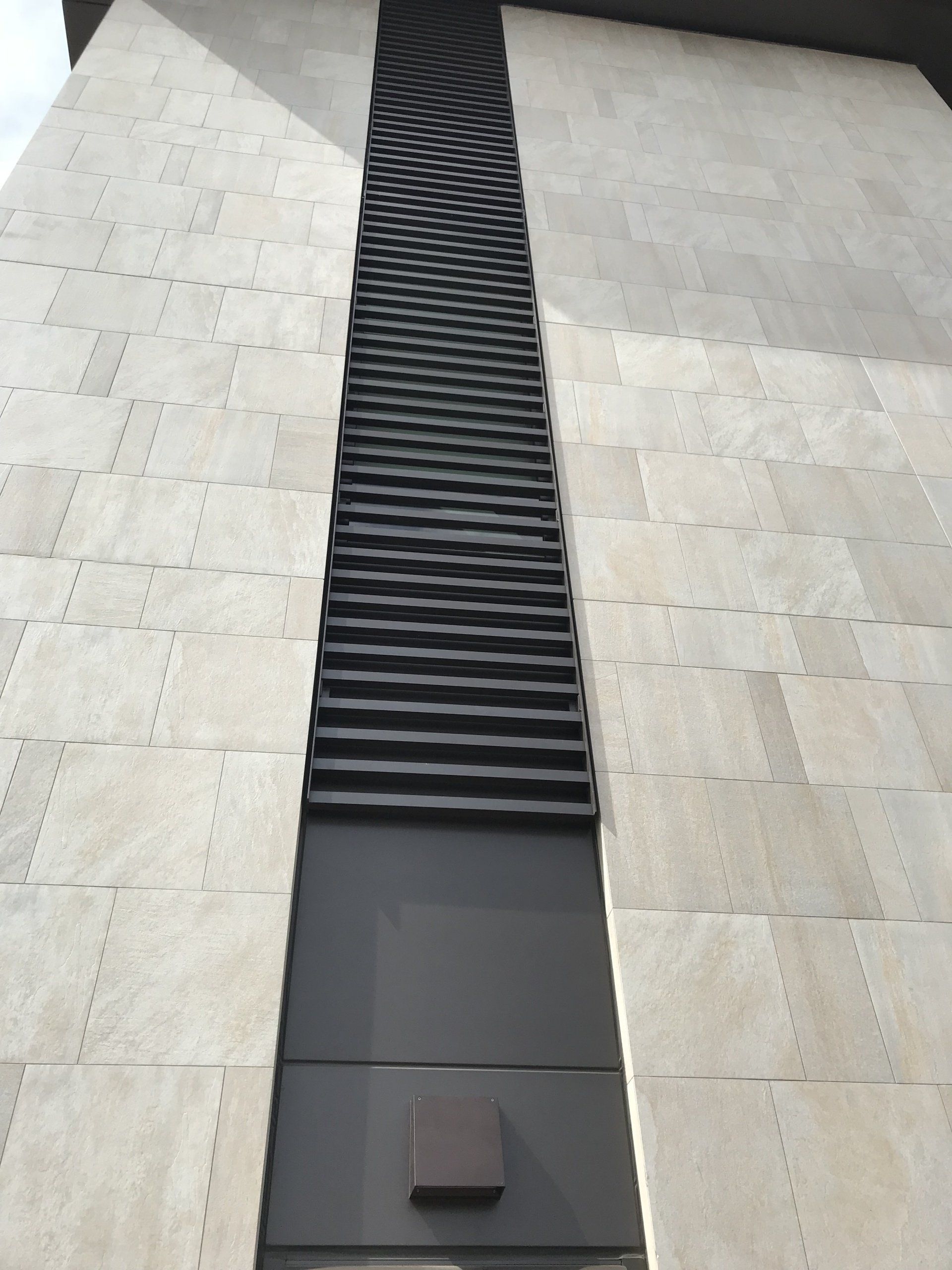 A building with a staircase on the side of it