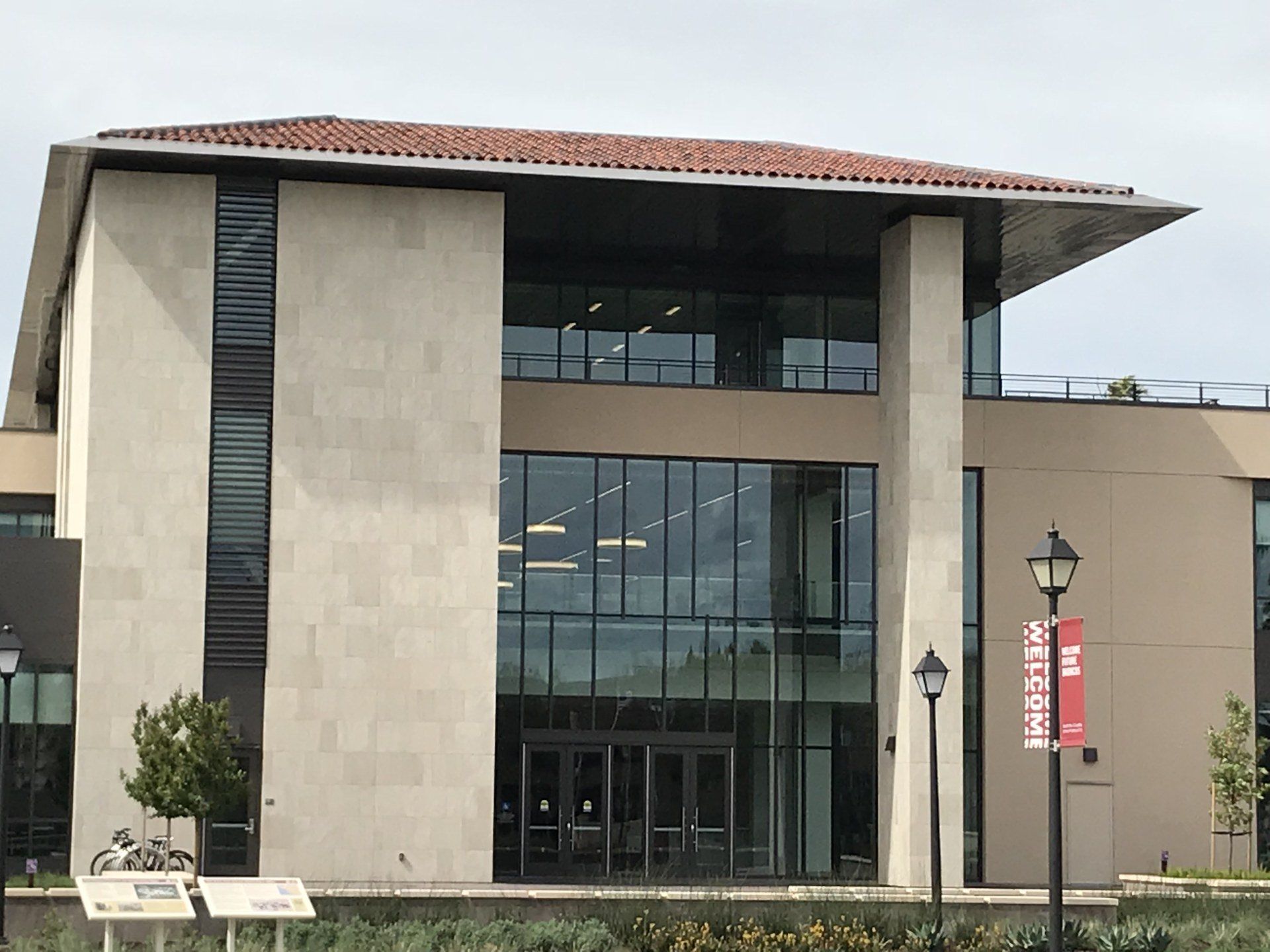 A large building with a red sign that says costa del sol