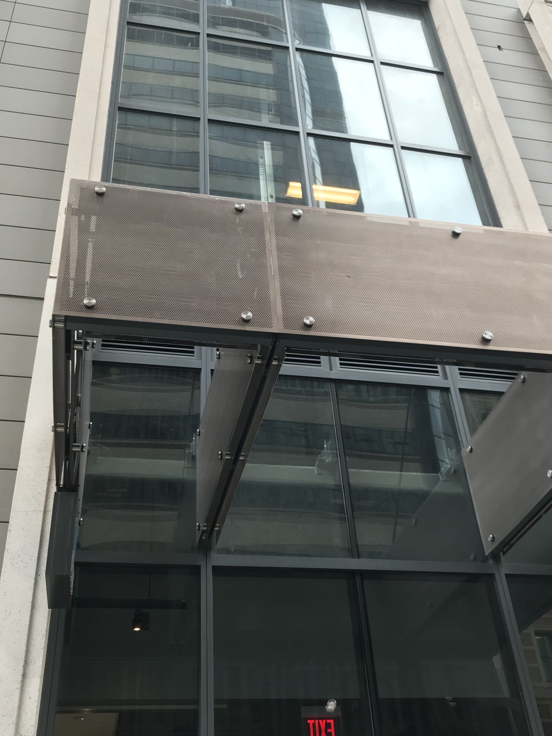 A building with a red exit sign on it