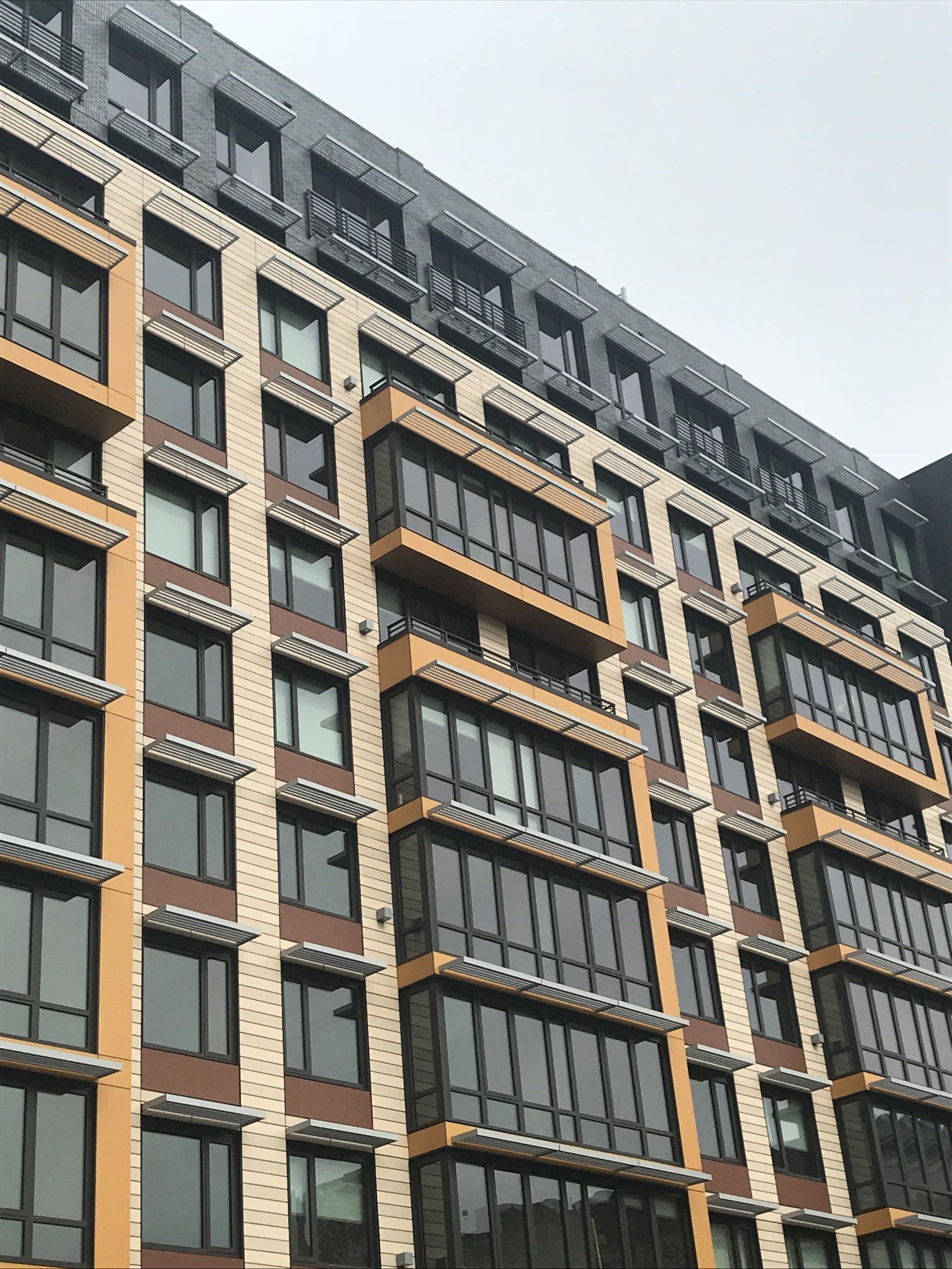 A large building with lots of windows and balconies
