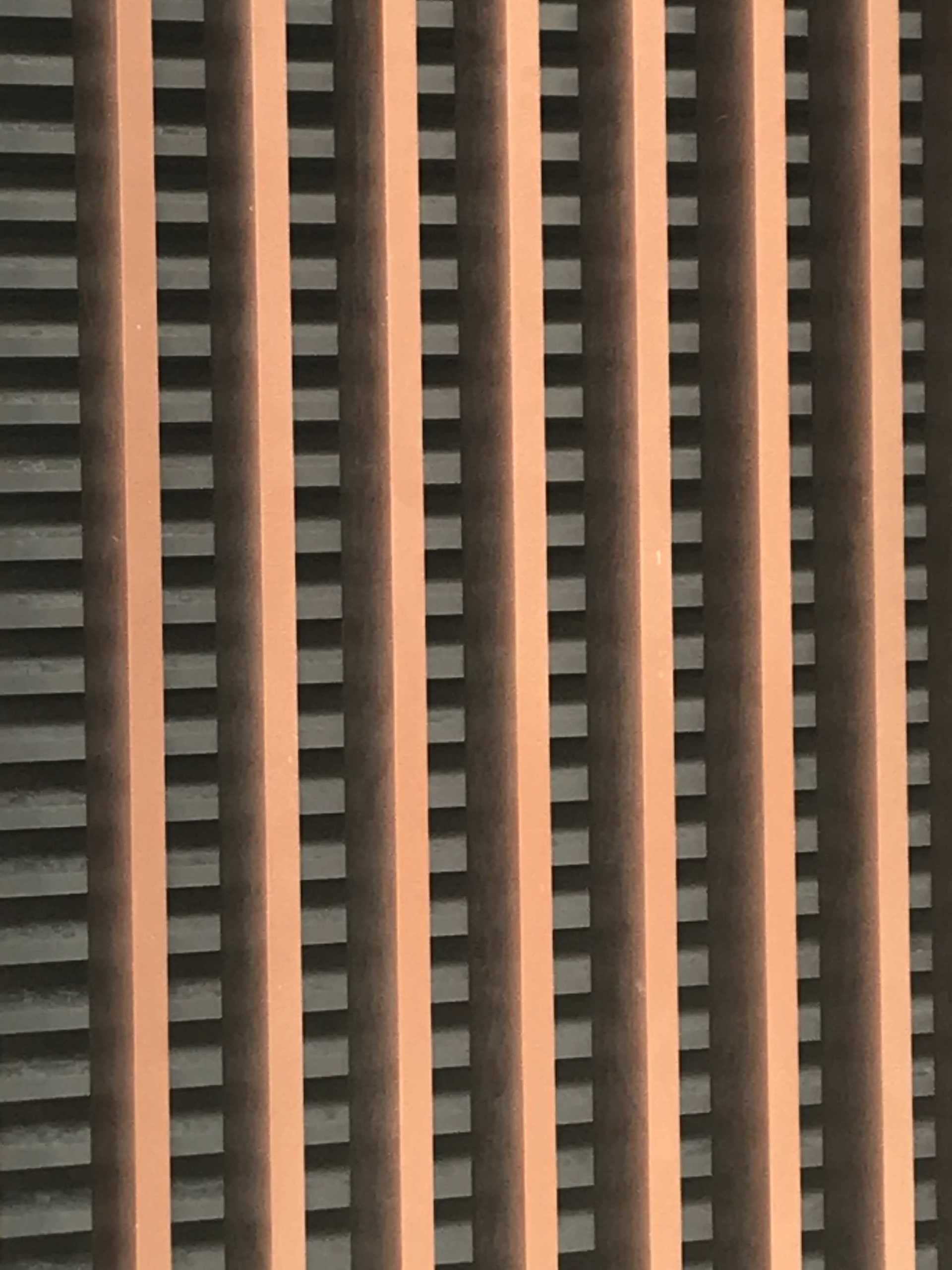 A close up of a row of lines on a wall.