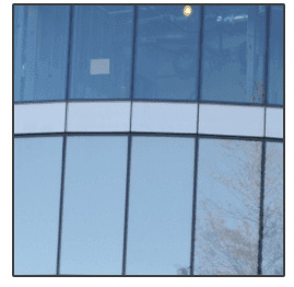 A picture of a building with a lot of windows