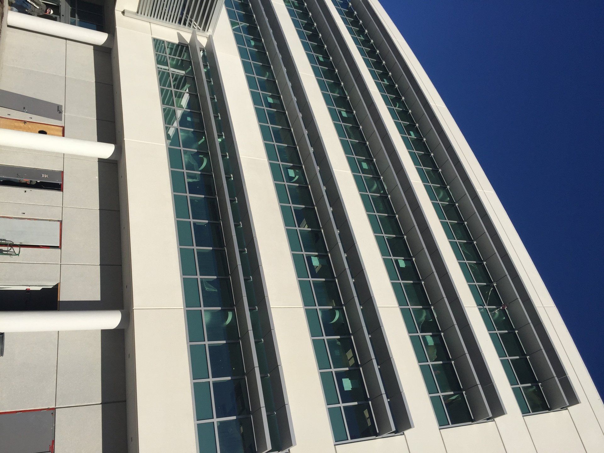 A tall building with a blue sky in the background