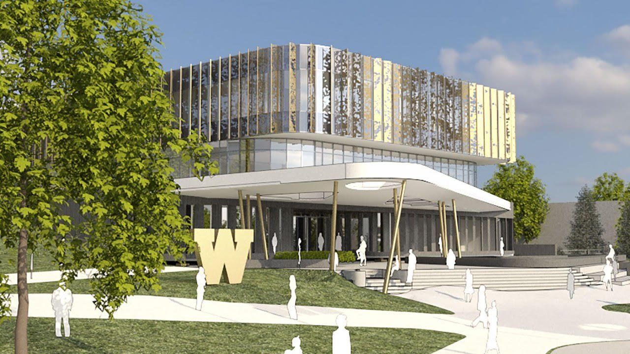 An artist 's impression of a large building with a large w on the side.