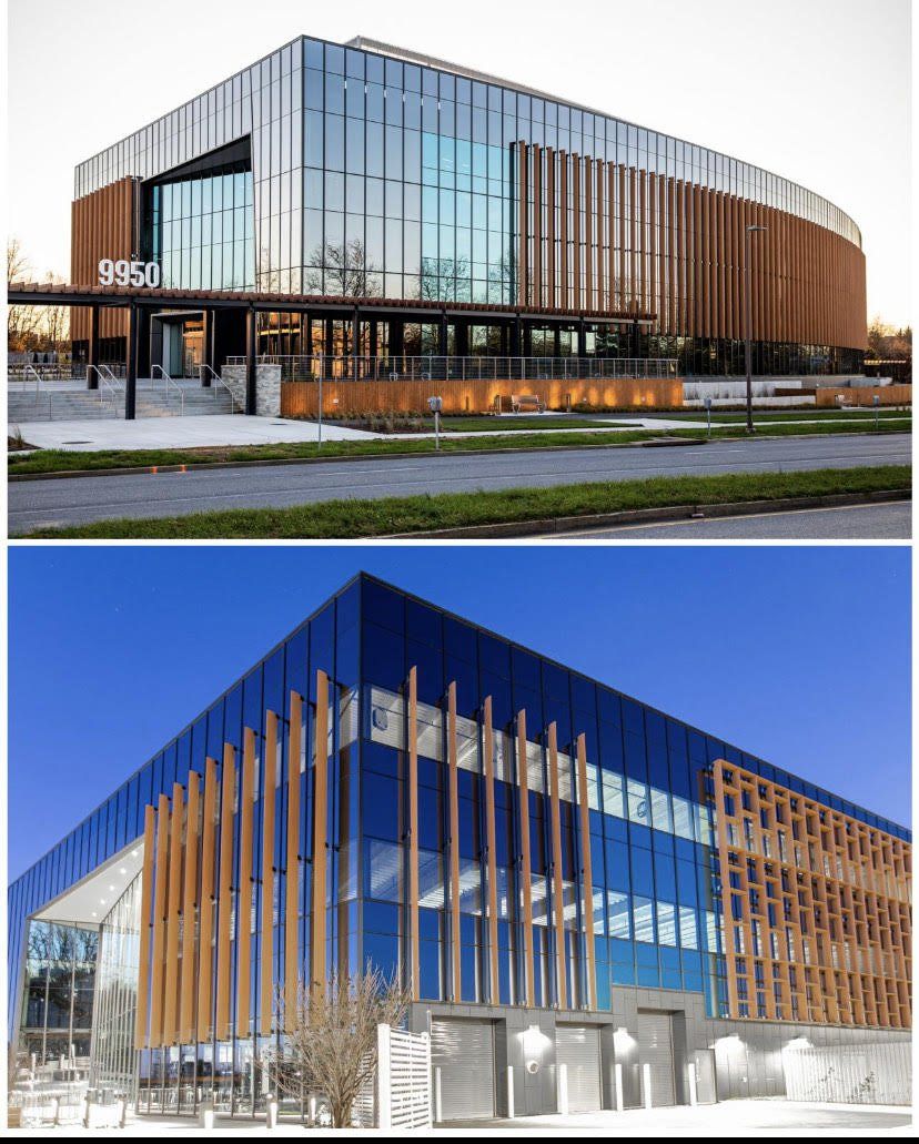 A building with a lot of windows and a wooden facade