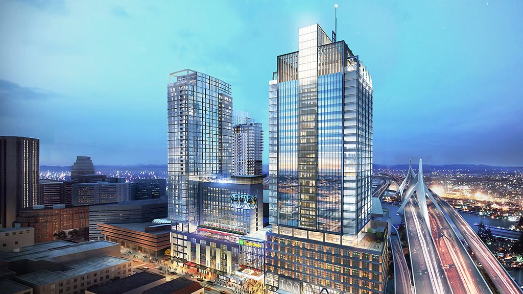 An artist 's impression of a large building in a city at night.