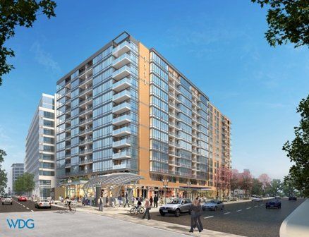 An artist 's impression of a building with wdg written on the bottom