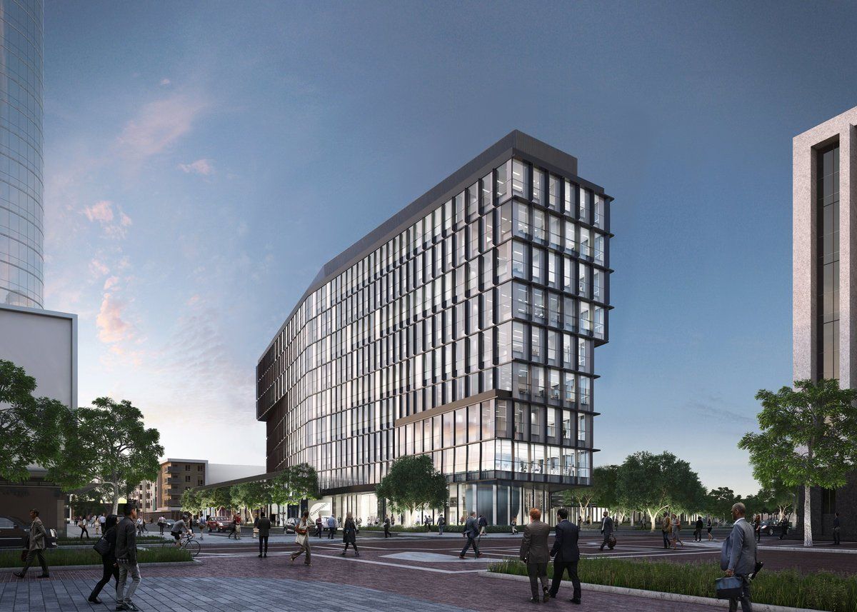 An artist 's impression of a large building with lots of windows
