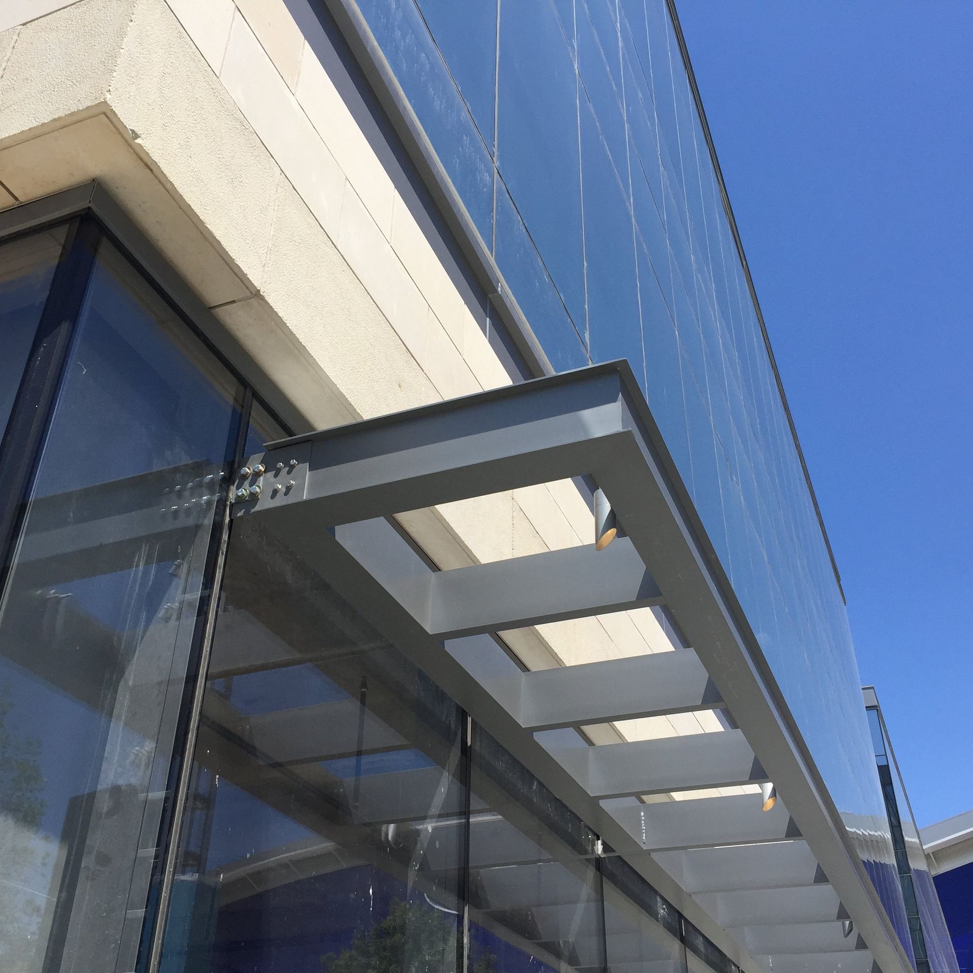 A building with a canopy on top of it