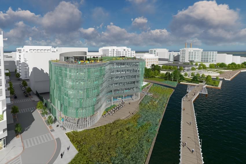 An artist 's impression of a large building next to a body of water.