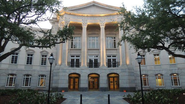 A large building with a lot of windows and columns