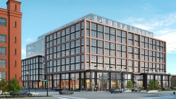 An artist 's impression of a large building with a lot of windows.