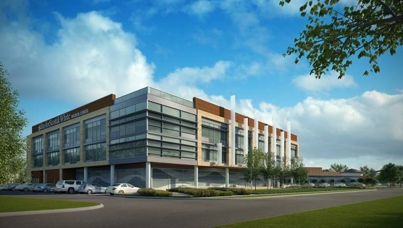 An artist 's impression of a large building with cars parked in front of it