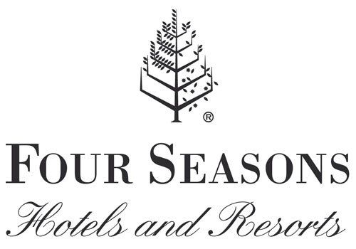 the logo for four seasons hotels and resorts has a tree on it .