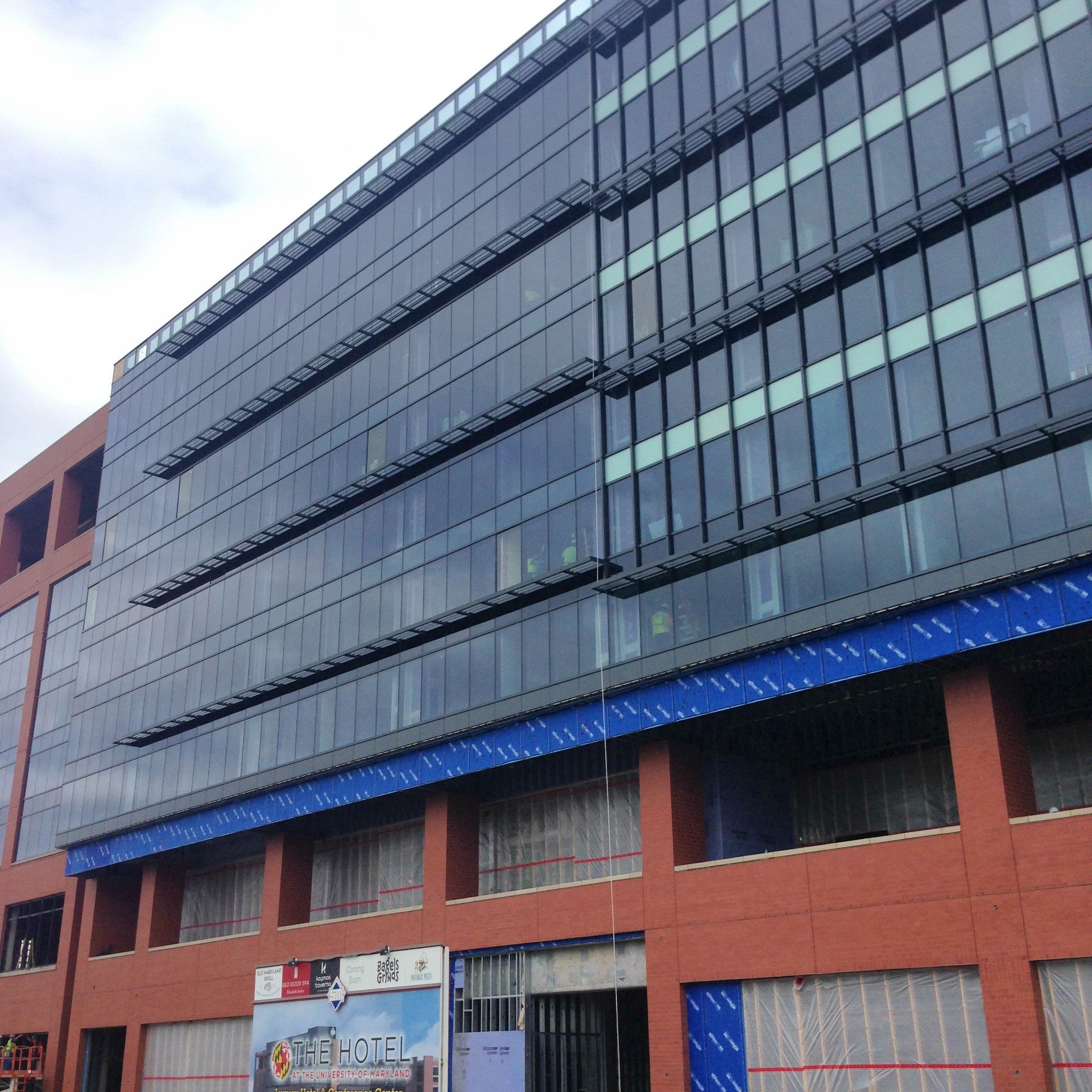 A large building with a sign on the side that says ' t-cell '