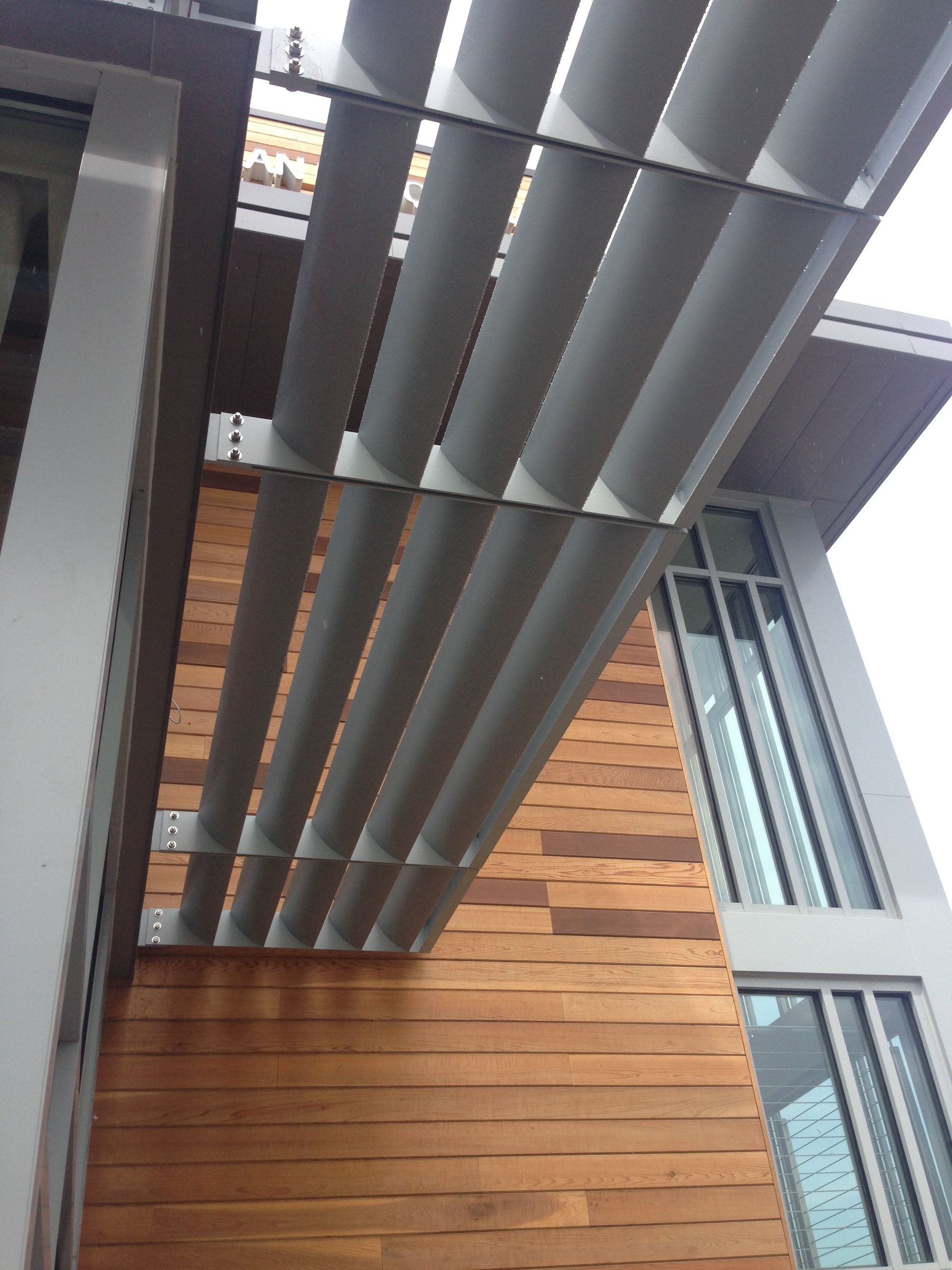 Looking up at a building with a lot of windows