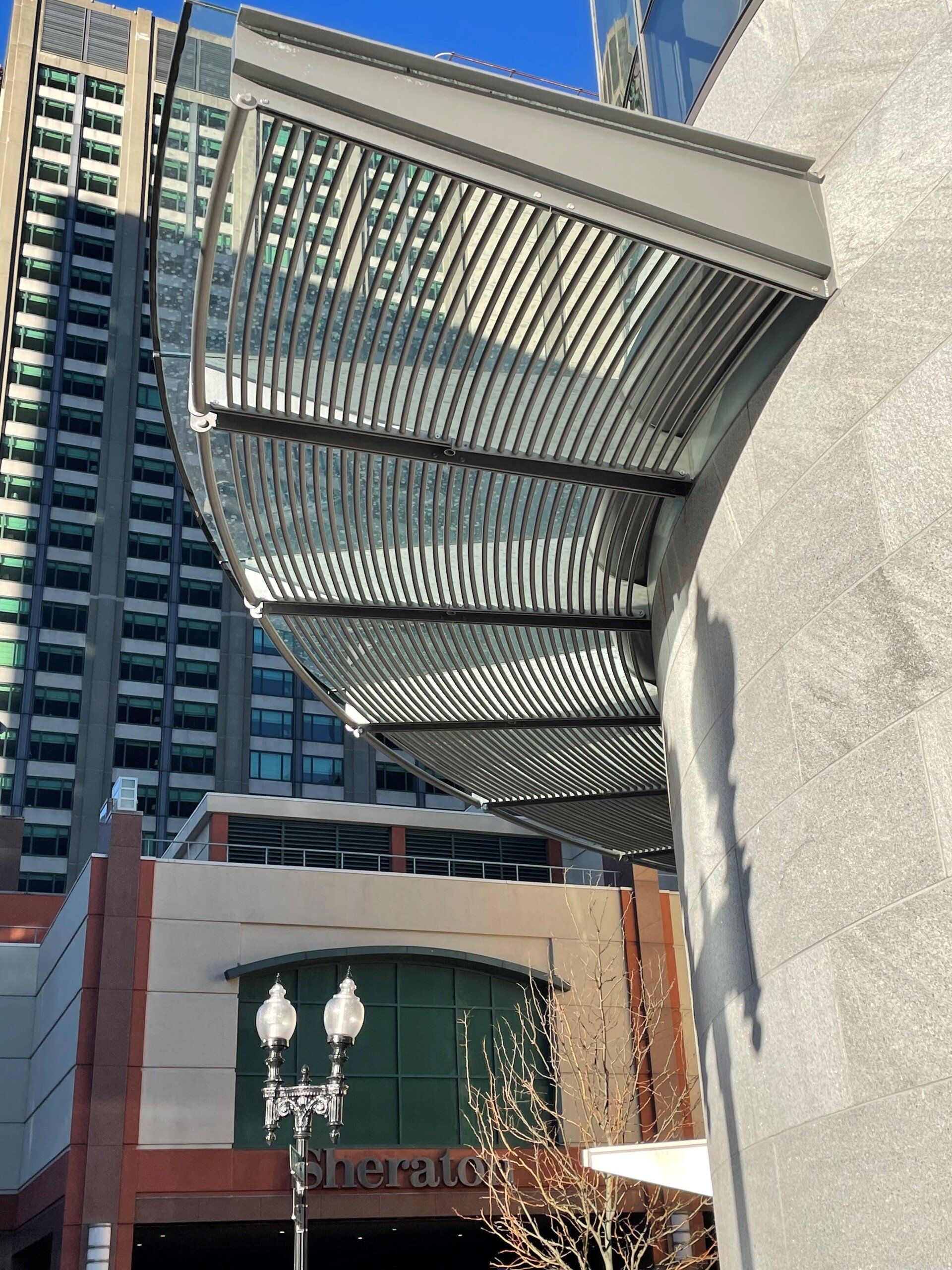 A building with the word sheraton on it